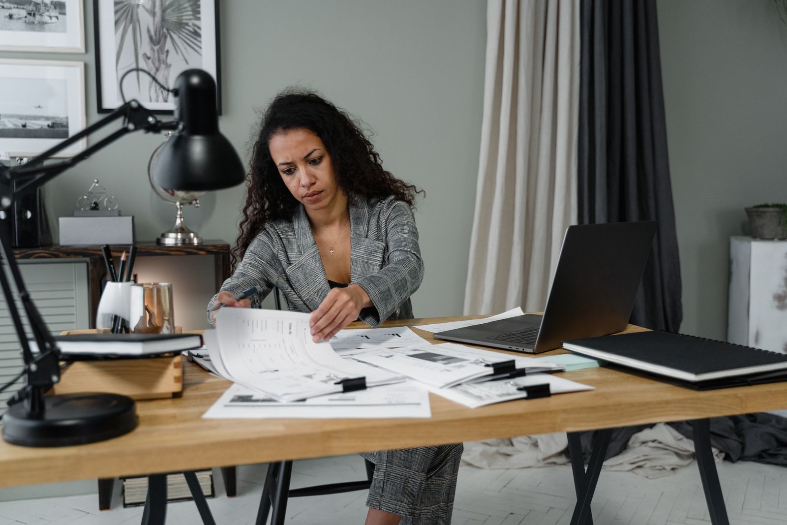 Business owner reviewing documents at a desk